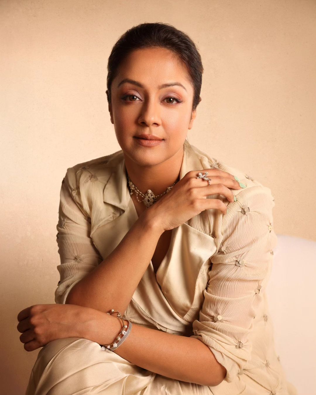 Tamil Actress Jyothika Stills In Grey Color Dress